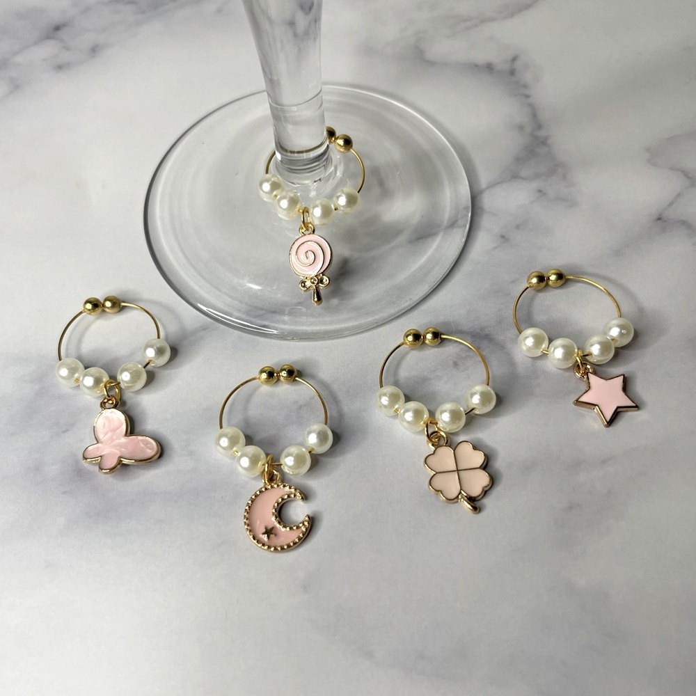 2/$10 ❤️❤️Pink & gold wine charms